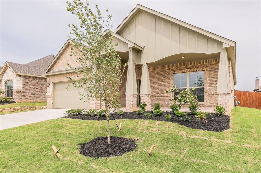 Front exterior of a new home in , Alvarado, TX, highlighting curb appeal (Image 20).