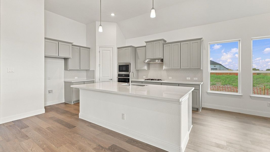 Furnished interior view inside a new home in Green Meadows Classic, Celina (Image 7).