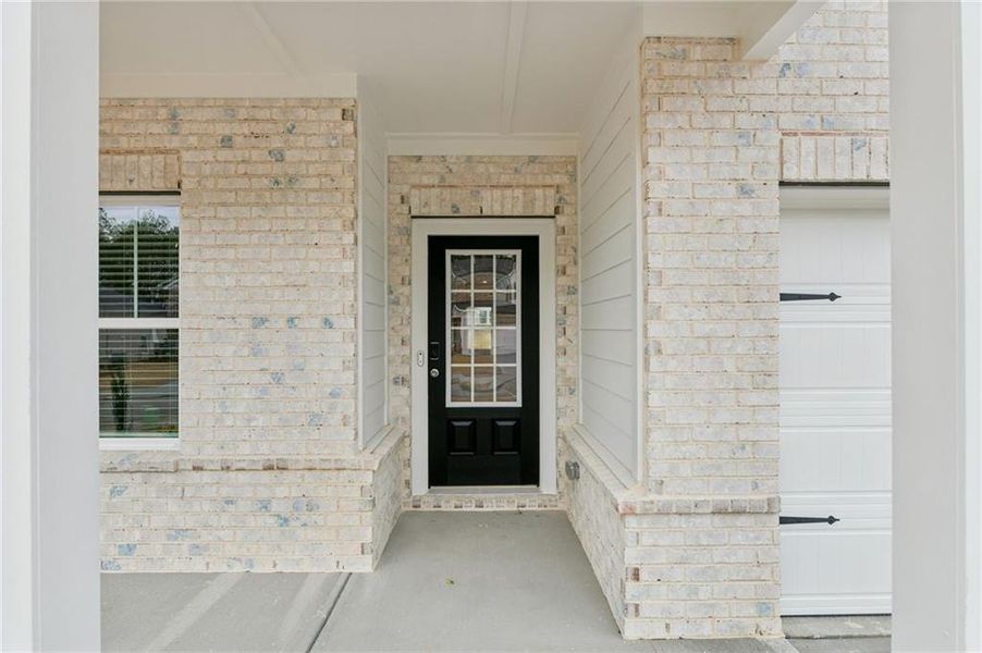 Exterior details and patio area of a home in Parkside at Grayson, Grayson (Image 27).