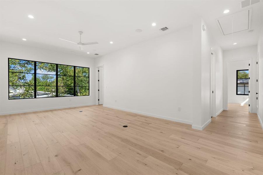 Another large living area on the second floor that connects all of the secondary bedrooms.