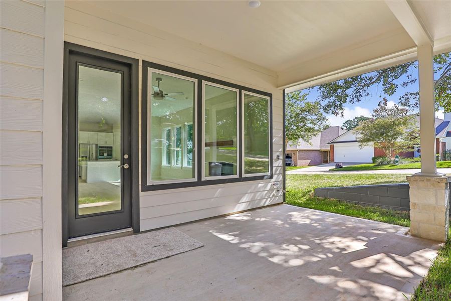 Exterior details and patio area of a home in , Conroe (Image 3).