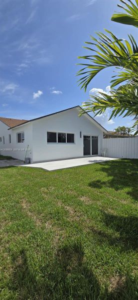 Exterior details and patio area of a home in , Miami (Image 3). Exterior details and patio area of a home in , Miami (Image 3).