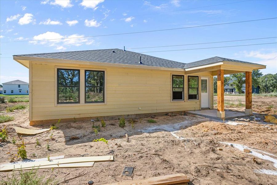 Front exterior of a new home in , Tolar, TX, highlighting curb appeal (Image 19). Front exterior of a new home in , Tolar, TX, highlighting curb appeal (Image 19).