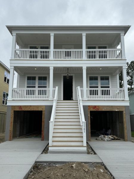 Front exterior of a new home in Oak Bluff, Charleston, SC, highlighting curb appeal (Image 19). Front exterior of a new home in Oak Bluff, Charleston, SC, highlighting curb appeal (Image 19).