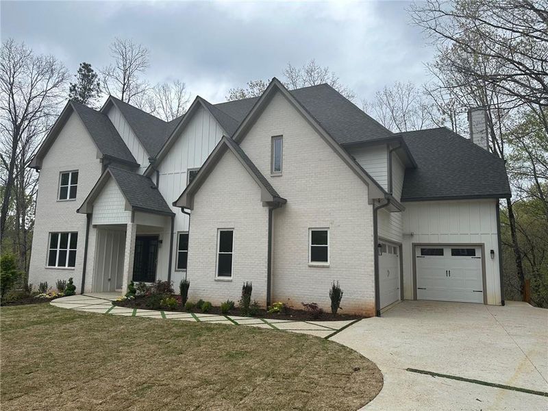 Front exterior of a new home in , Atlanta, GA, highlighting curb appeal (Image 1). Front exterior of a new home in , Atlanta, GA, highlighting curb appeal (Image 1).