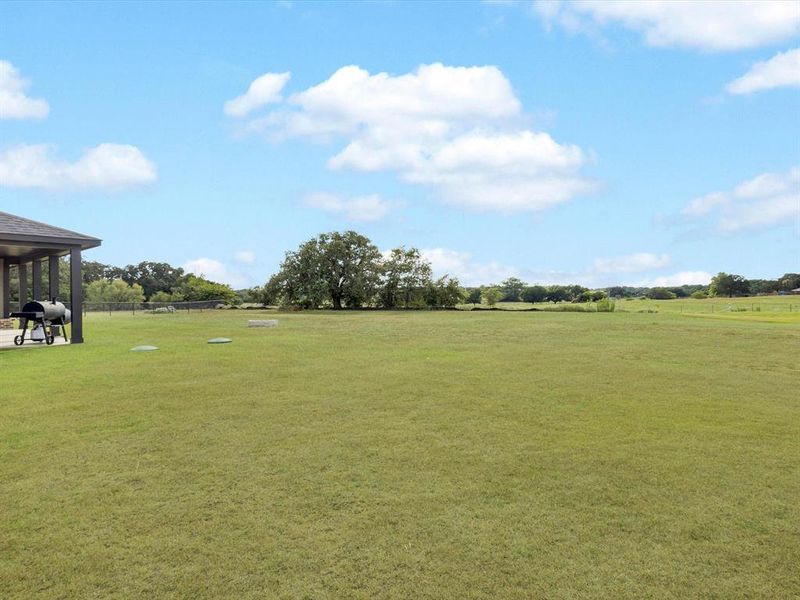 Front exterior of a new home in Regent Park, Springtown, TX, highlighting curb appeal (Image 20).