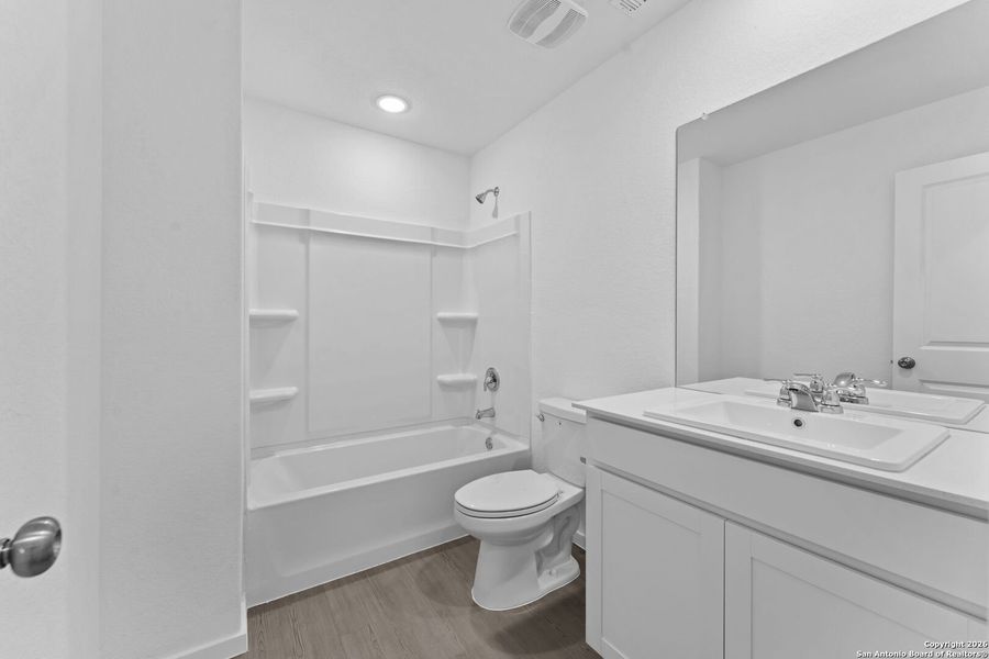 Furnished interior view inside a new home in Voss Farms, New Braunfels (Image 6).