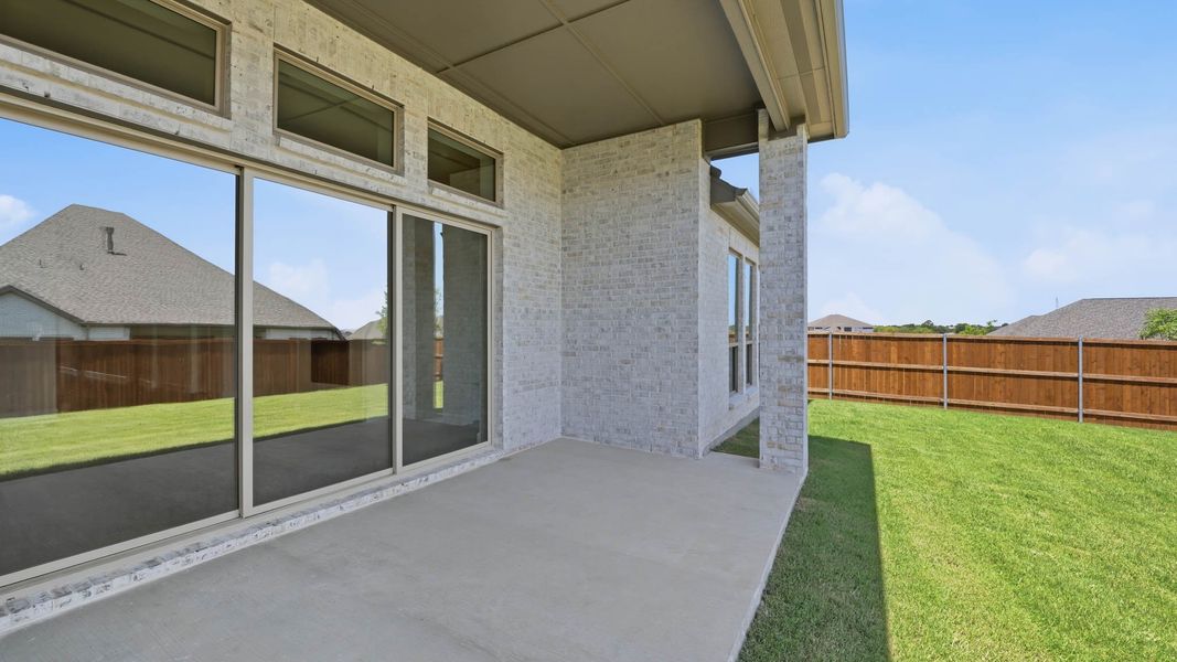 Exterior details and patio area of a home in Sweetgrass, Haslet (Image 3).