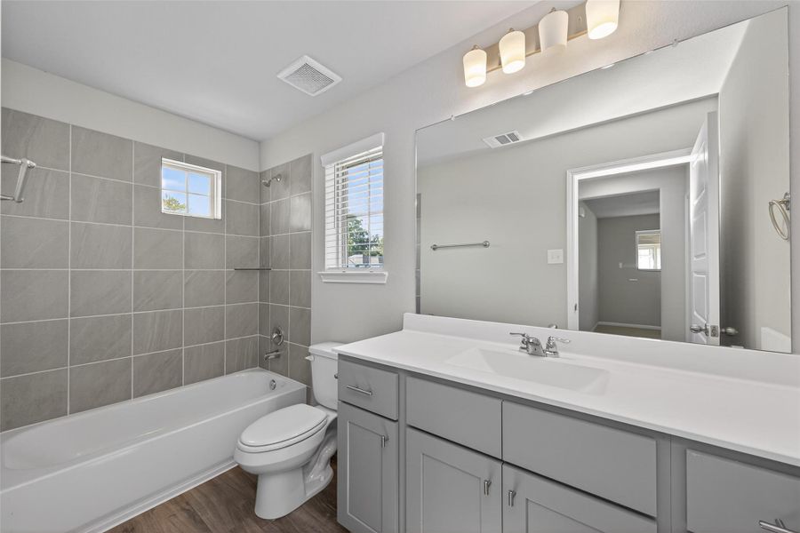 Furnished interior view inside a new home in Woodland Lakes, Huffman (Image 4).