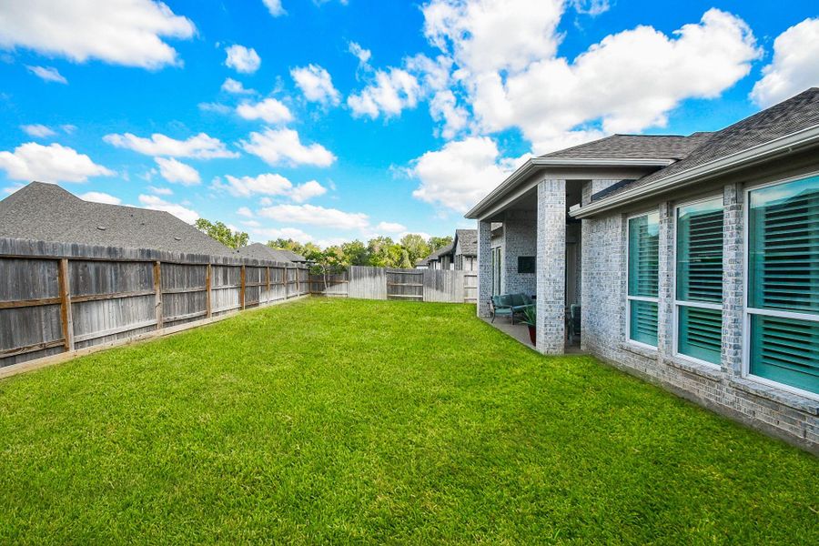 Back yard is a clean slate for your landscaping vision; easement allows privacy from back neighbors.