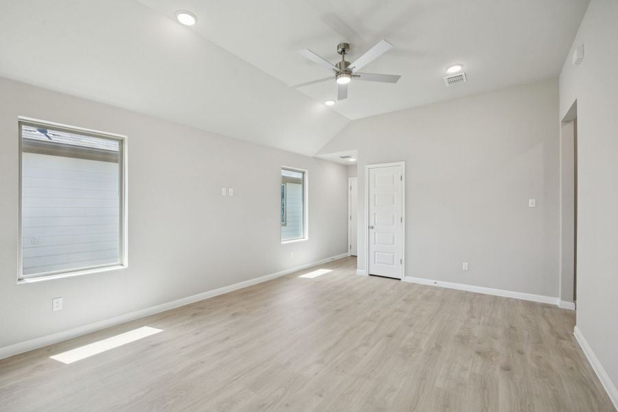 Living Room in the Pine home plan by Trophy Signature Homes - REPRESENTATIVE PHOTO