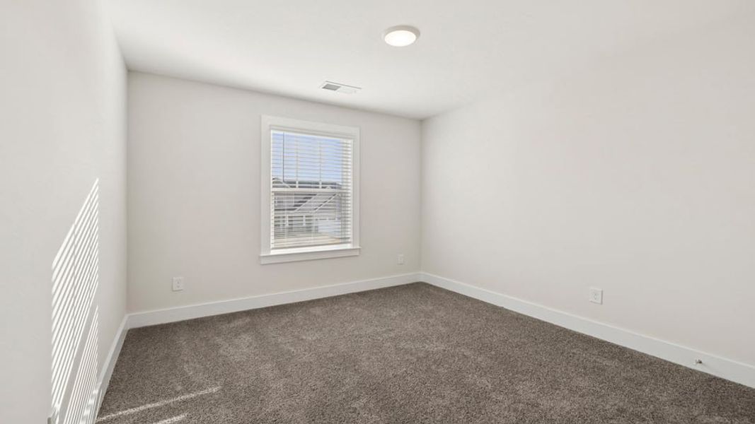 Representative unfurnished interior of a home built from the Phoenix by D.R. Horton in Edgewood Estates, Greenville (Image 20).