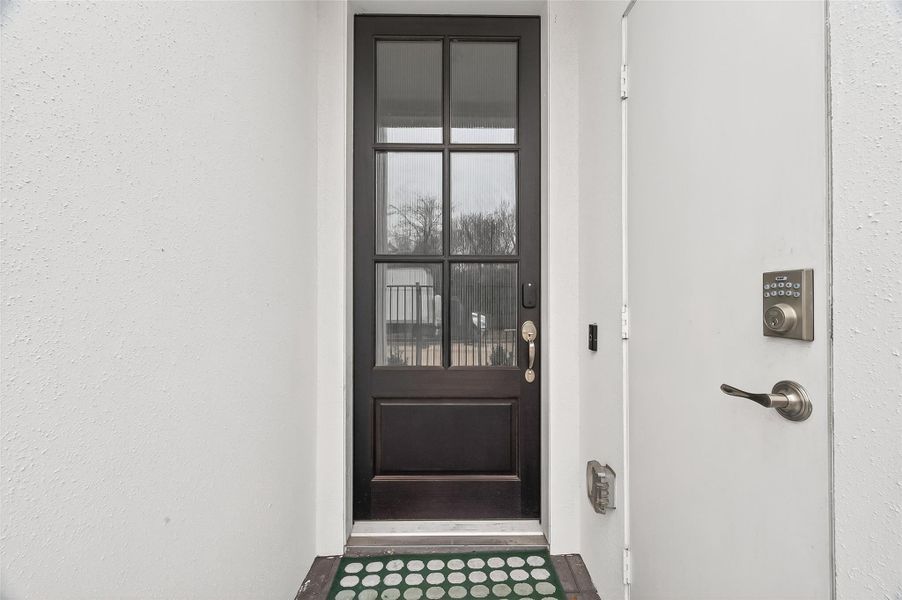 Exterior details and patio area of a home in The Corner At Buffalo Pointe, Houston (Image 25).