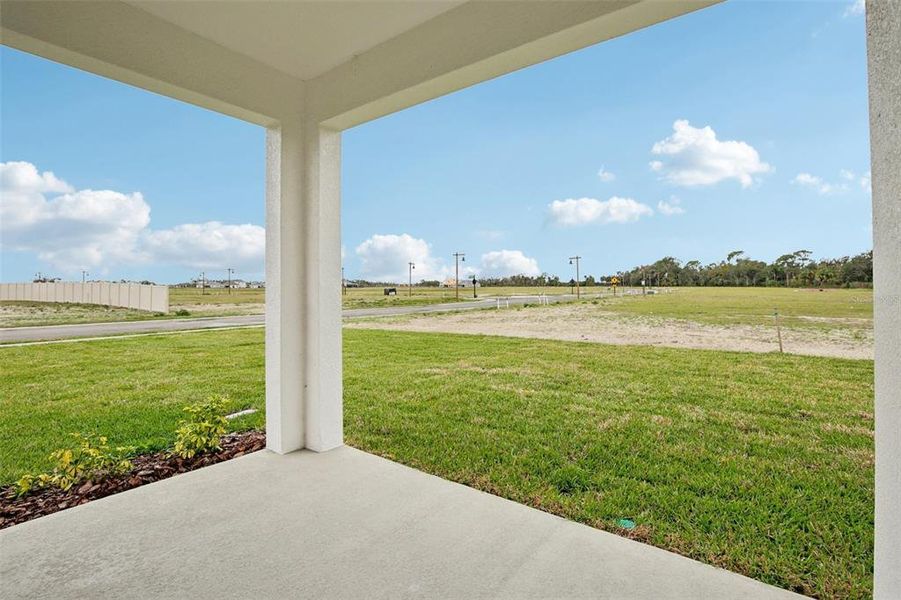 Exterior details and patio area of a home in Oakfield Trails, Parrish (Image 12).