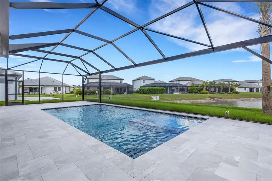 Exterior details and patio area of a home in Cassata Lakes, Nokomis (Image 26).