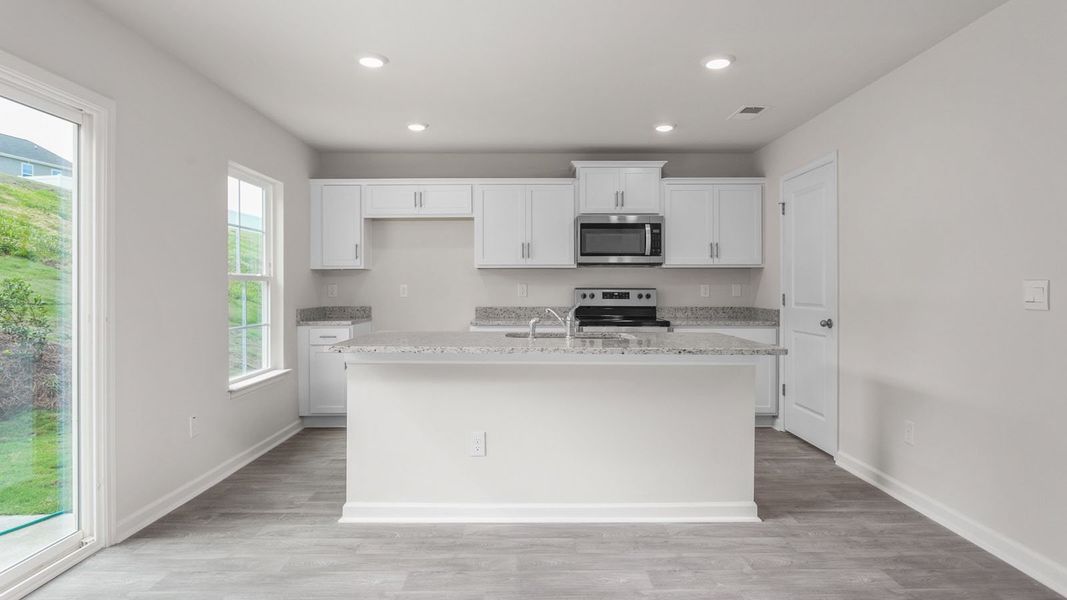 Representative furnished interior of a home built from the PENWELL by D.R. Horton in English Farm, Archdale (Image 4).