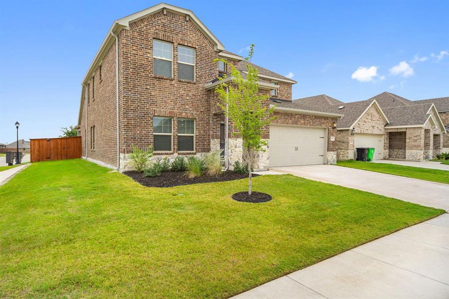 Front exterior of a new home in Northstar, Haslet, TX, highlighting curb appeal (Image 24).