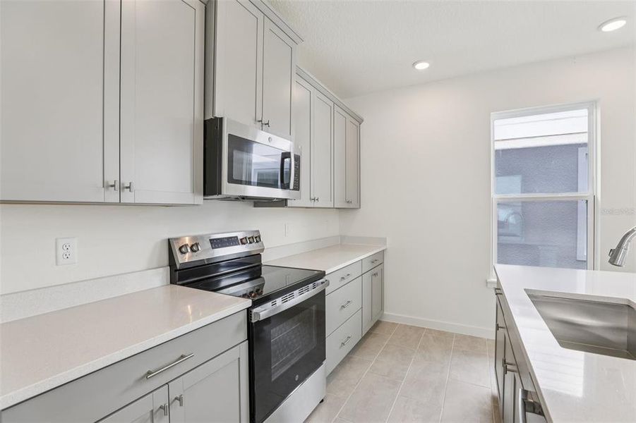 Furnished interior view inside a new home in Trinity Place, St. Cloud (Image 10).