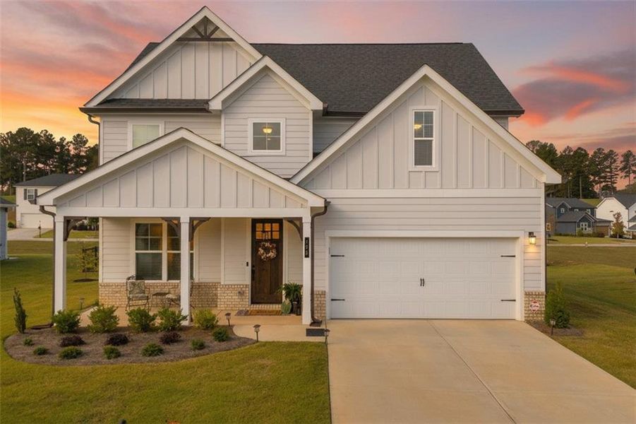 Front exterior of a new home in , Homer, GA, highlighting curb appeal (Image 25).
