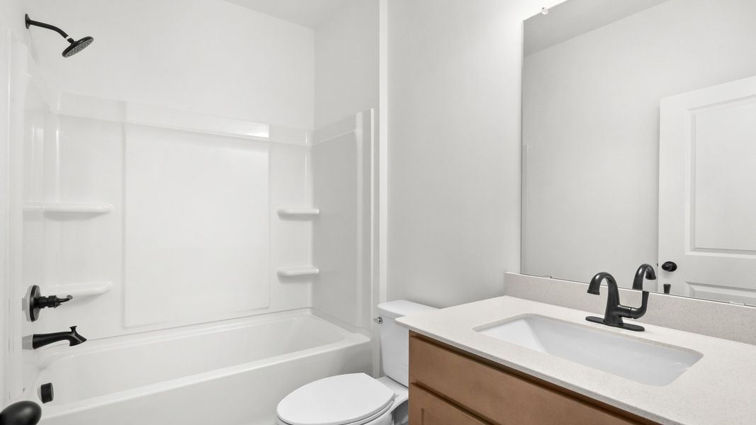 Furnished interior view inside a new home in Bluffs at Sun Colony, Longs (Image 19).