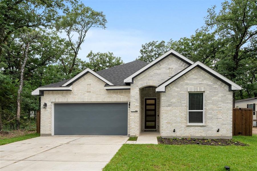 Front exterior of a new home in , Mabank, TX, highlighting curb appeal (Image 1). Front exterior of a new home in , Mabank, TX, highlighting curb appeal (Image 1).