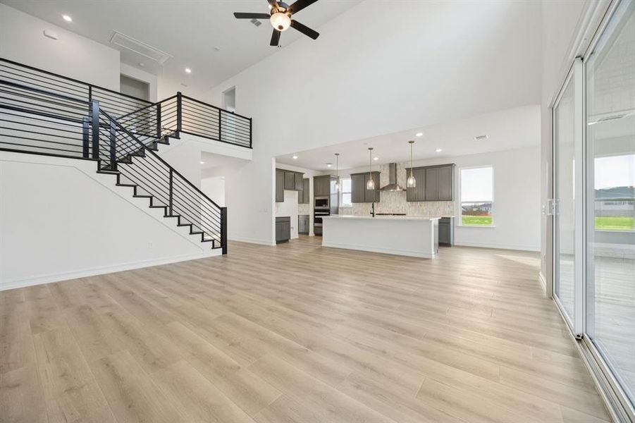 Gathering room with view of main living areas. * Model representation.