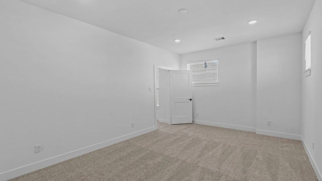 Spacious, unfurnished interior of a new home in Attwater 55s, Waller (Image 30).