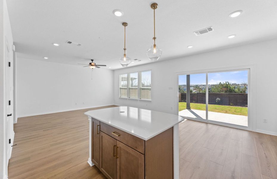 Representative furnished interior of a home built from the Alexander by Pulte Homes in Wolf Ranch, Georgetown (Image 5).