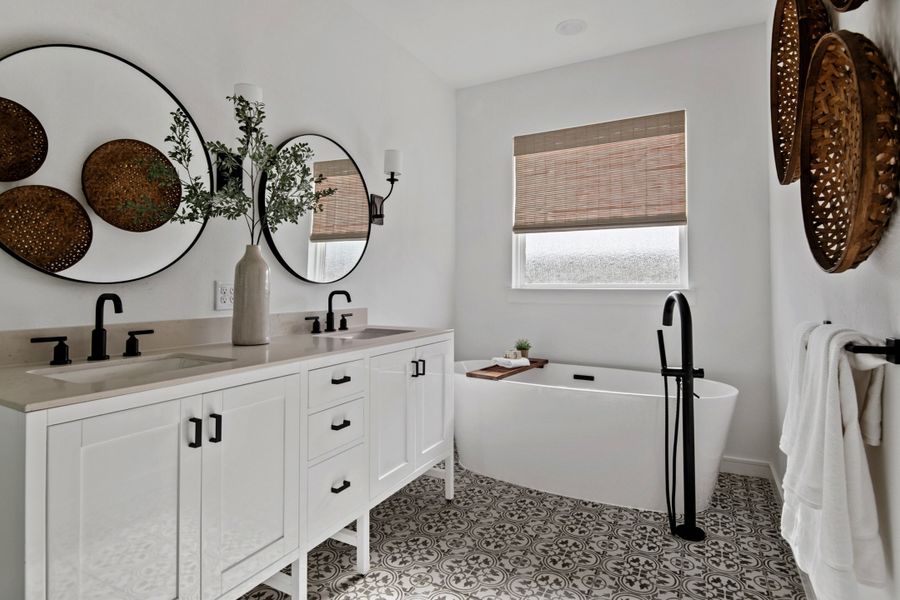 Primary bath with dual sinks and freestanding tub