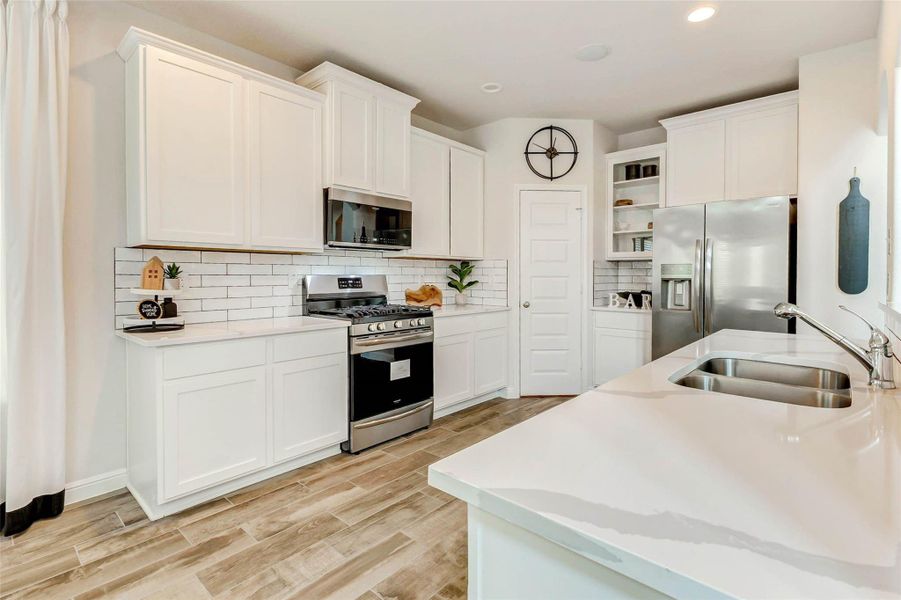 Offering stainless steel appliances, built-in microwave and generous counter space. Offering stainless steel appliances, built-in microwave and generous counter space.