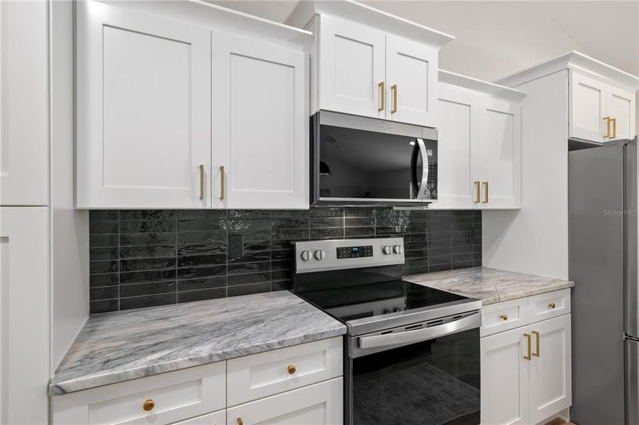 Furnished interior view inside a new home in , Dunnellon (Image 29).