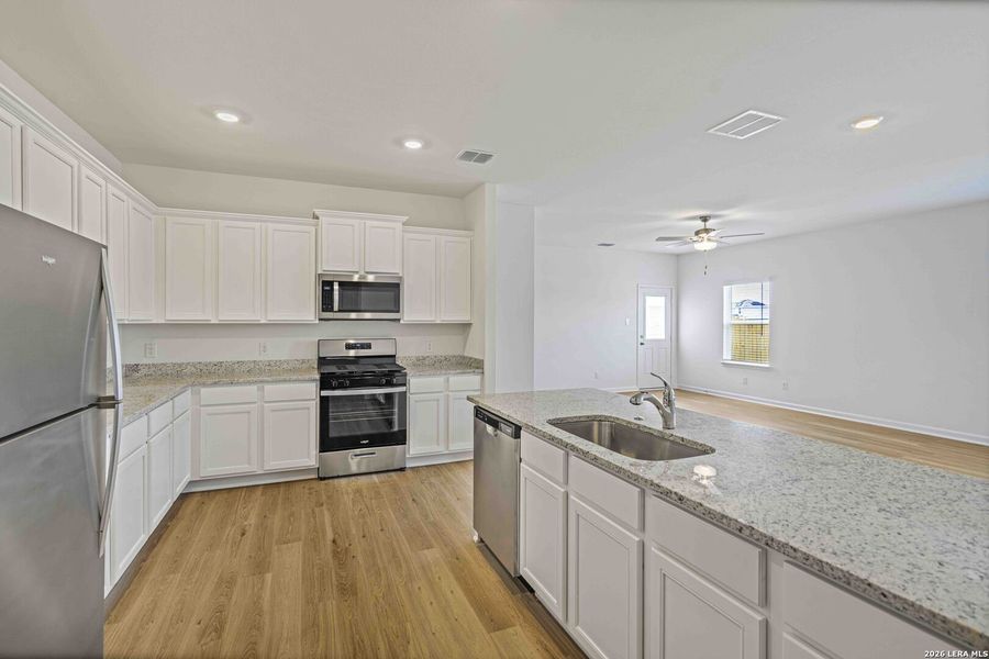 Furnished interior view inside a new home in , San Antonio (Image 7).