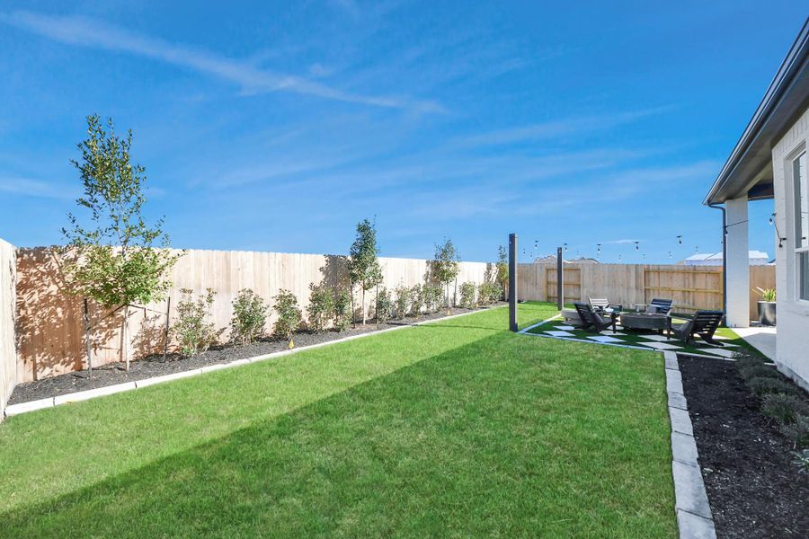 Exterior details and patio area of a home in Meridiana, Manvel (Image 3).