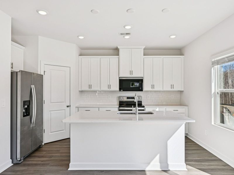 Furnished interior view inside a new home in Harper Landing, Stanley (Image 3).