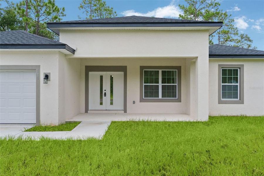 Exterior details and patio area of a home in , Citrus Springs (Image 4).