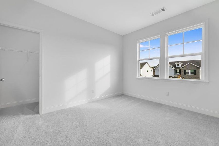Spacious, unfurnished interior of a new home in Bennett Farm, Loganville (Image 29).