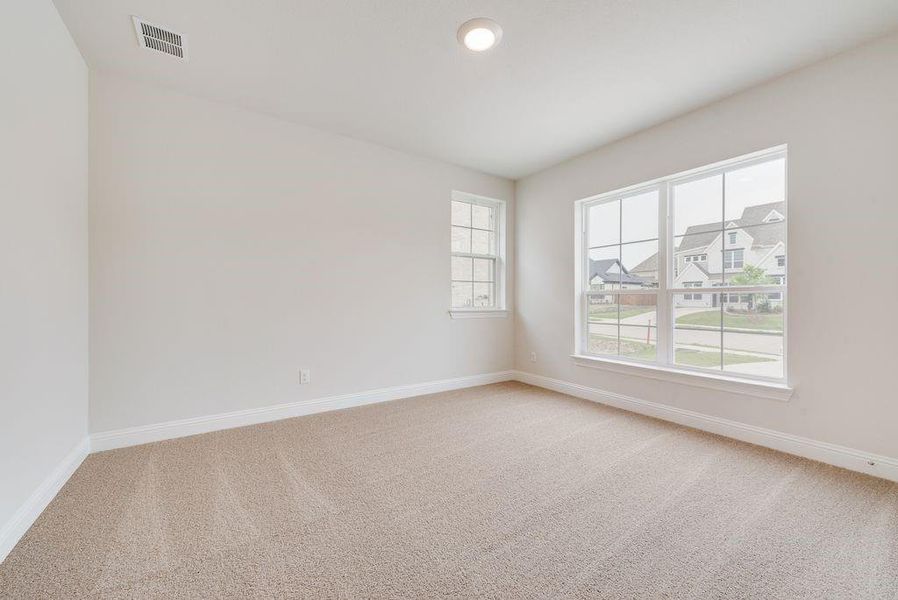 Spacious, unfurnished interior of a new home in Breezy Hill, Rockwall (Image 28).