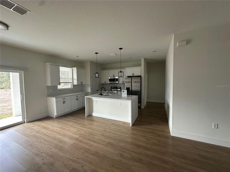 Furnished interior view inside a new home in , Dunnellon (Image 11).