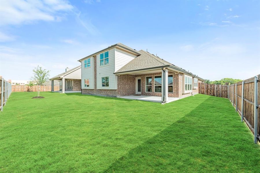 Exterior details and patio area of a home in West Crossing, Anna (Image 3). Exterior details and patio area of a home in West Crossing, Anna (Image 3).