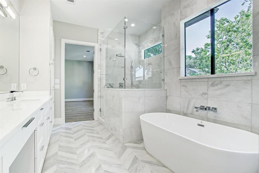 Oversized shower and large soaking tub.