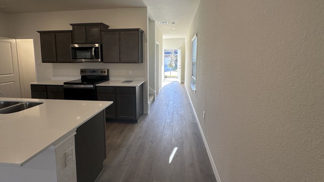 Representative furnished interior of a home built from the HANNA by D.R. Horton in Northspur, Forney (Image 5).
