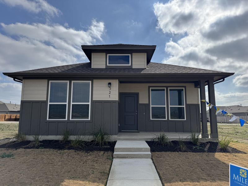 Front exterior of a new home in Porter Country, Buda, TX, highlighting curb appeal (Image 3).