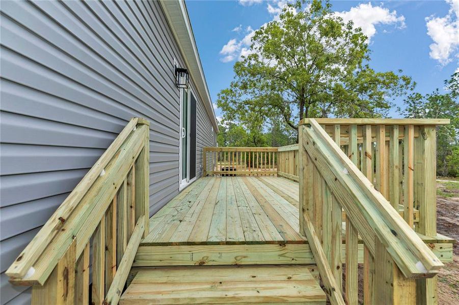 Exterior details and patio area of a home in , Williston (Image 26).