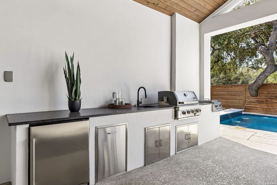 Exterior details and patio area of a home in , Leon Valley (Image 37).