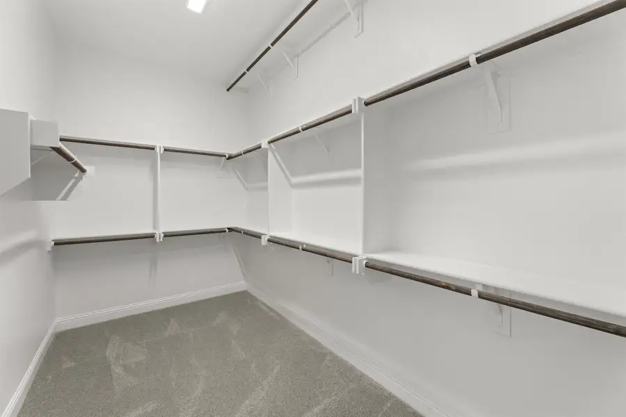 Representative unfurnished interior of a home built from the Portsmouth by Windsor Homes in Nelson Lake Estates, Rockwall (Image 27).