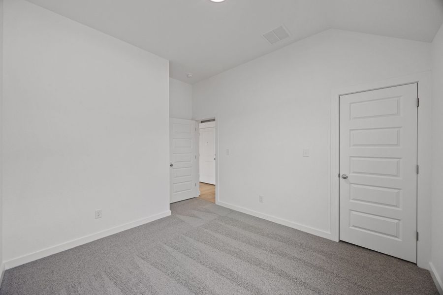 Bedroom in the Colorado home plan by Trophy Signature Homes – REPRESENTATIVE PHOTO Bedroom in the Colorado home plan by Trophy Signature Homes – REPRESENTATIVE PHOTO