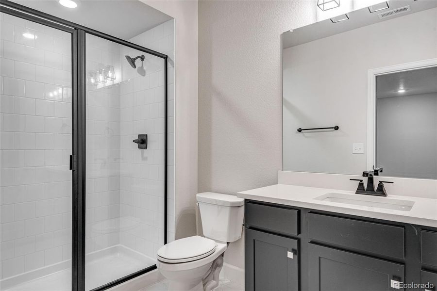 Furnished interior view inside a new home in Crescendo at The Aurora Highlands, Aurora (Image 8).