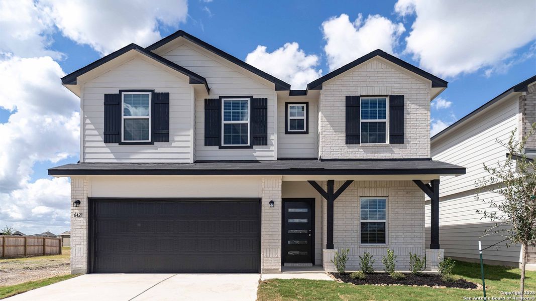Front exterior of a new home in Morgan Meadows, San Antonio, TX, highlighting curb appeal (Image 1). Front exterior of a new home in Morgan Meadows, San Antonio, TX, highlighting curb appeal (Image 1).
