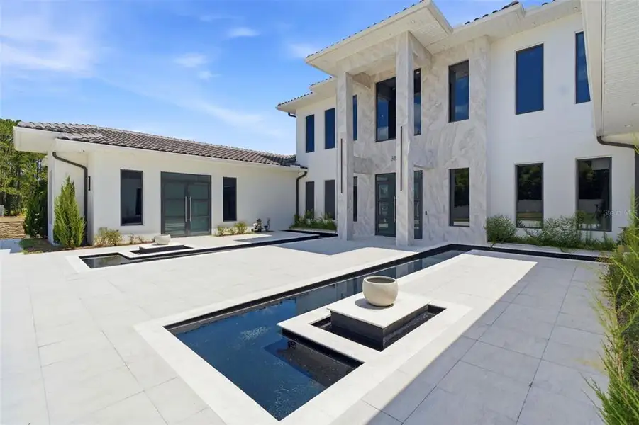 Exterior details and patio area of a home in , Lake Mary (Image 3). Exterior details and patio area of a home in , Lake Mary (Image 3).