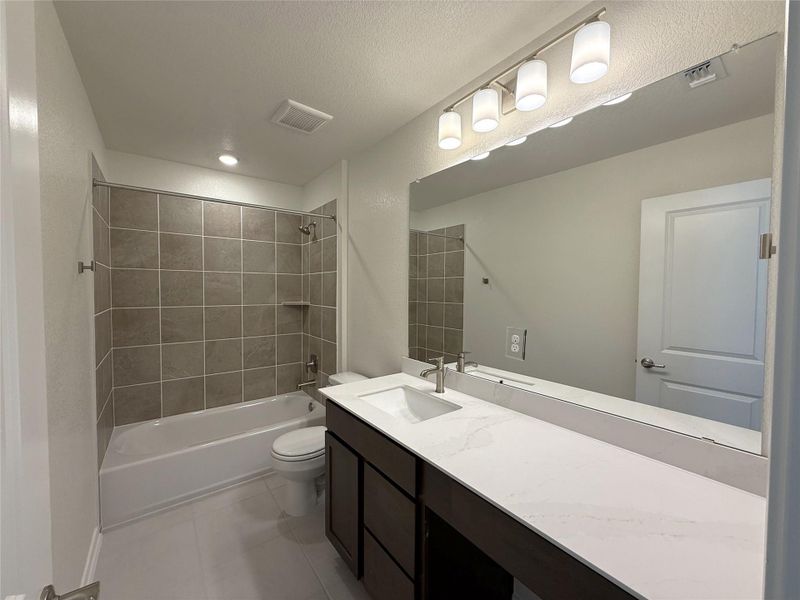 Furnished interior view inside a new home in River Bluff, Leander (Image 11).